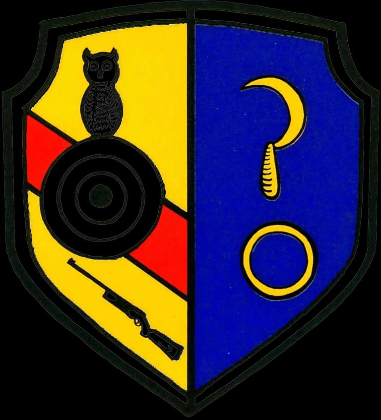Wappen des Schützenvereins Köndringen mit Eule, Zielscheibe und Gewehr.